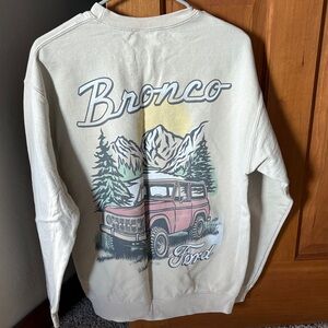 Ford Cream Crewneck Sweatshirt with Pink Bronco Graphic